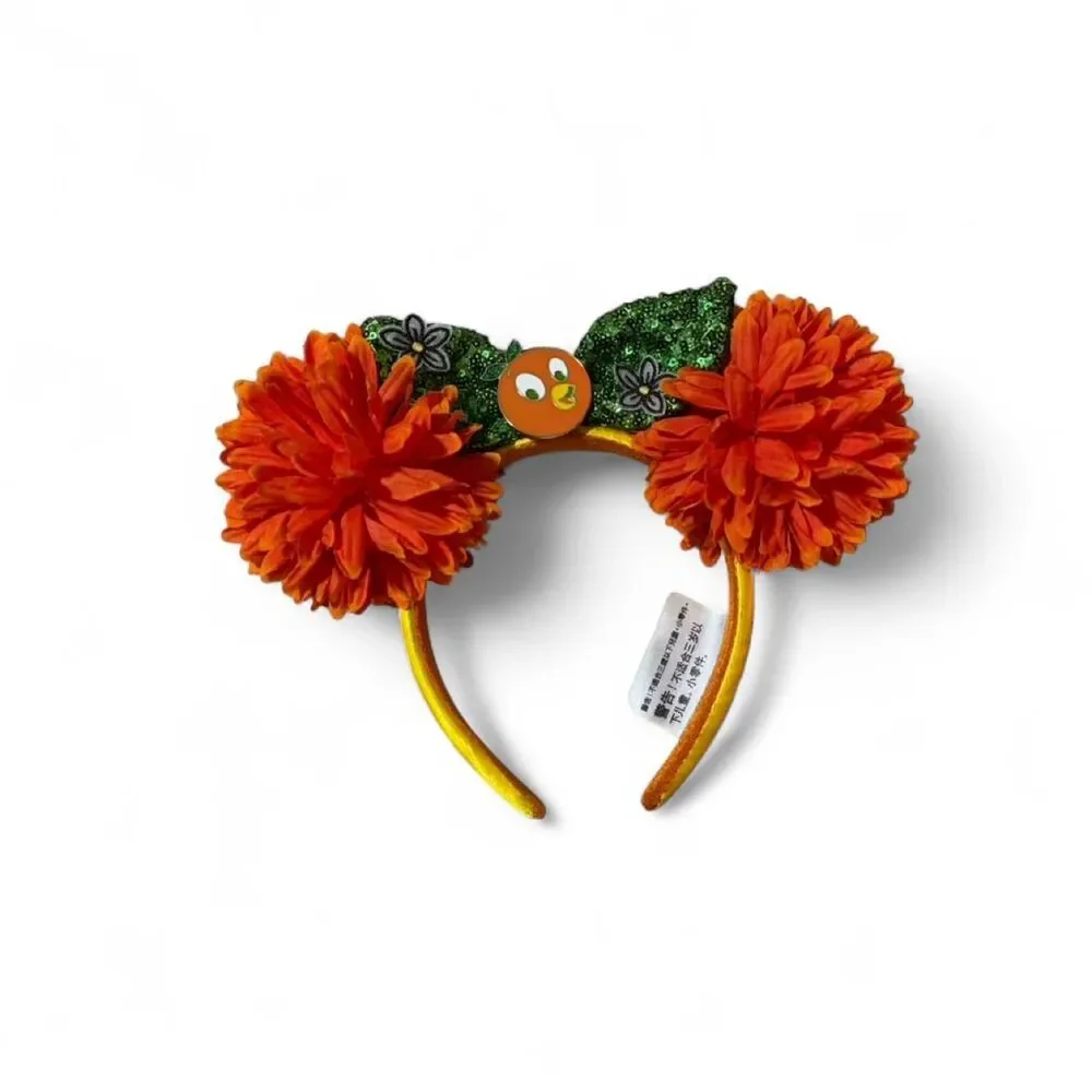 Disney Parks Disney world orange bird headband with orange pom-poms